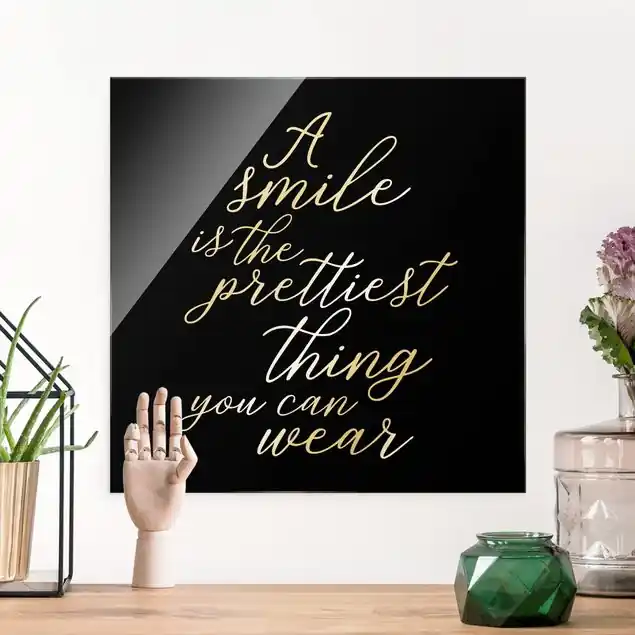 A smile is the prettiest thing Schwarz Glasbild Abverkauf